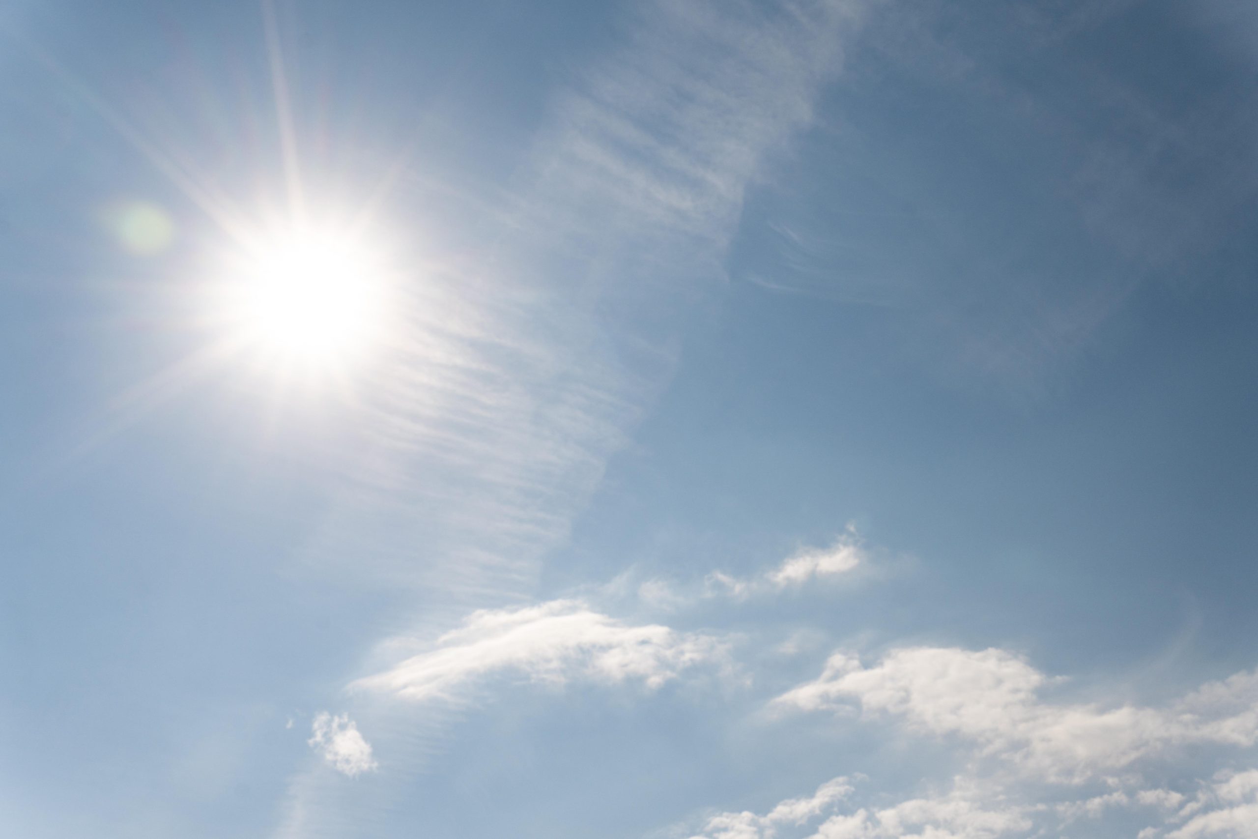 sun rays cloudy sky scaled