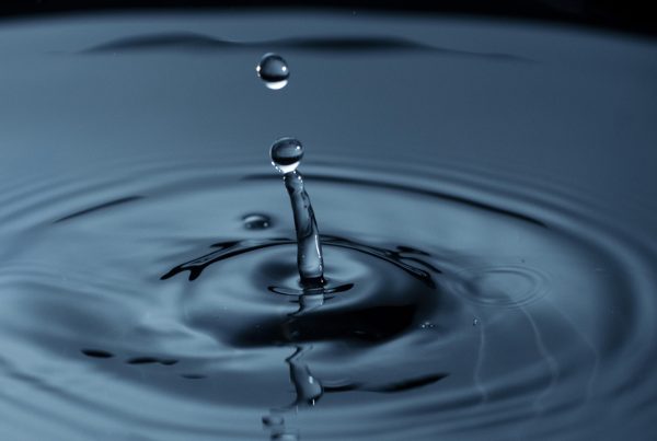 water droplets creating ripple liquid